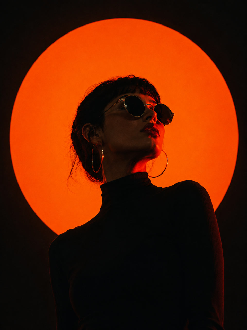 Orange backlit fashion portrait generated from a HyperPrompt reversed prompt.